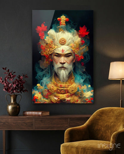 Glass art print of an ornate bearded figure with golden headpiece and red flowers displayed on dark wall above wooden console table.