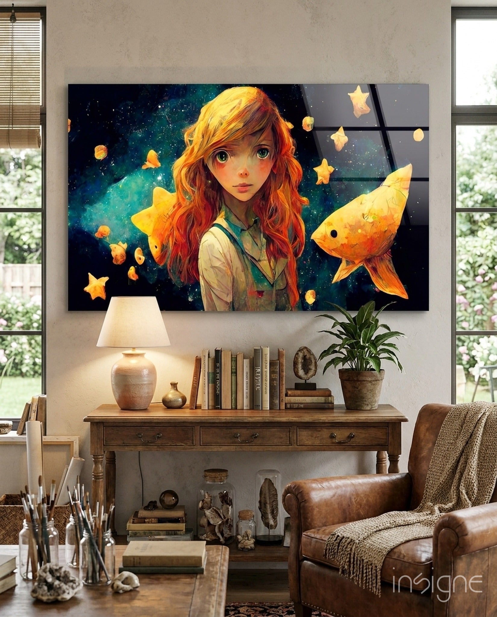 Glass wall art depicting red-haired anime girl with glowing goldfish and stars against dark teal background, mounted above wooden desk in study room.