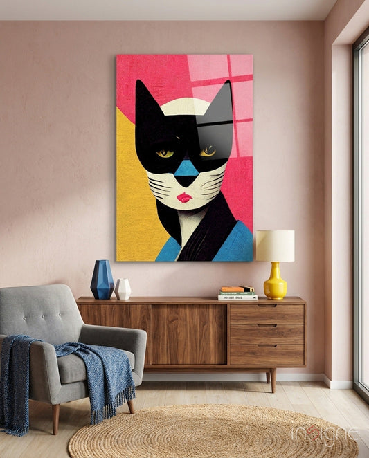 Colorful pop art glass wall art depicting a stylized black cat with geometric features displayed above a mid-century wooden dresser in a living room setting.