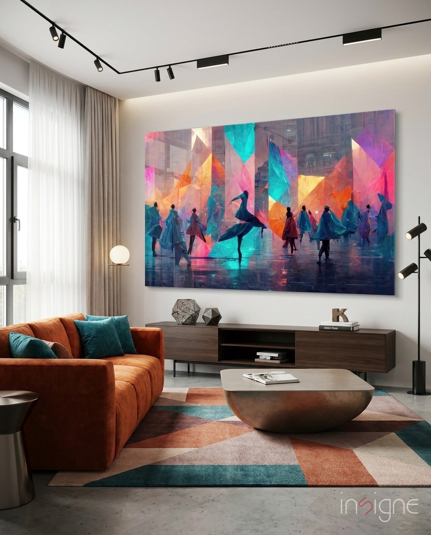 Colorful abstract glass wall art depicting silhouetted figures in geometric pink, orange, teal, and yellow tones displayed in modern living room.