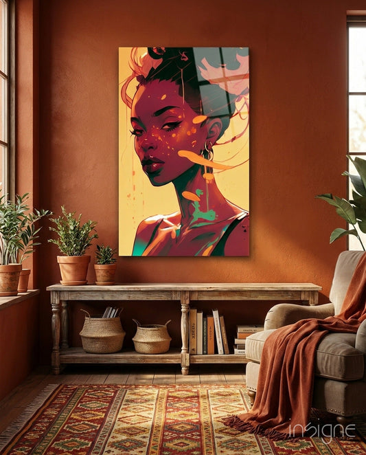Vibrant pop art portrait of a woman in warm tones displayed on terracotta wall above wooden console table with plants and books.