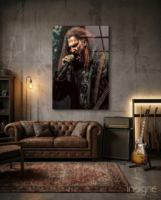 Glass wall art featuring long-haired metal vocalist with microphone, displayed above brown leather sofa in music studio room setting.