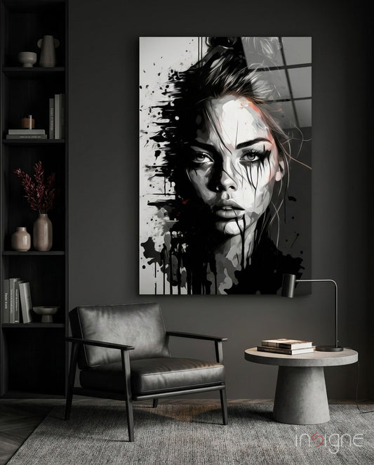 Modern living room interior featuring a large black and white abstract portrait glass wall art above a leather chair.