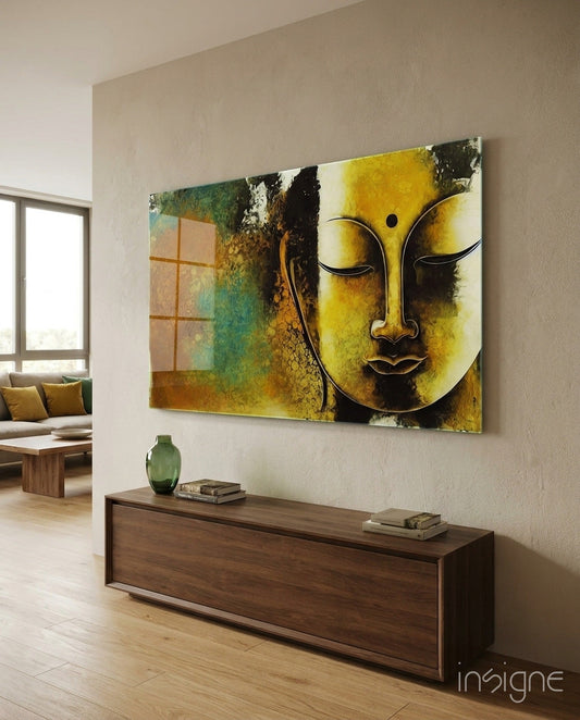Golden yellow Buddha face glass wall art mounted above a wooden console table in a modern living room interior.