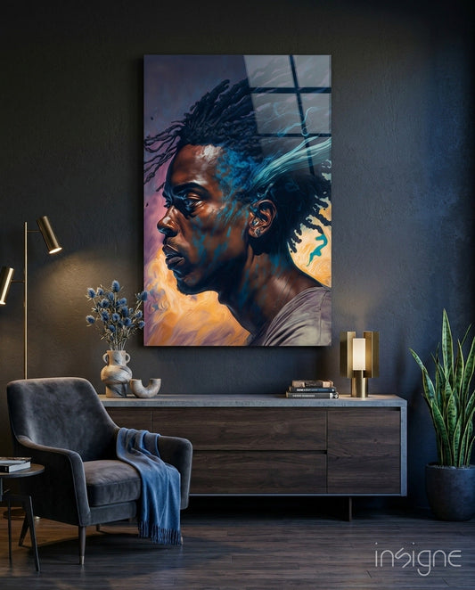 Modern living room featuring portrait wall art of man with blue locs against orange and pink gradient, displayed above dark wood console.