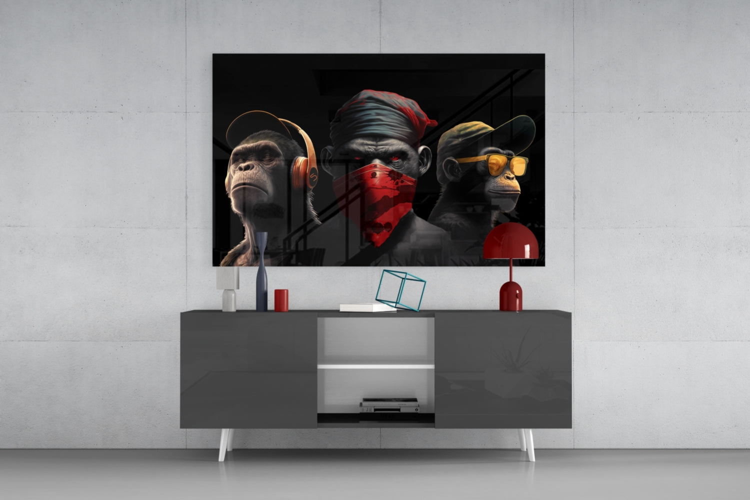 Three stylized monkeys wearing headphones, blindfold, and sunglasses displayed on a dark TV stand in a modern living room setting.