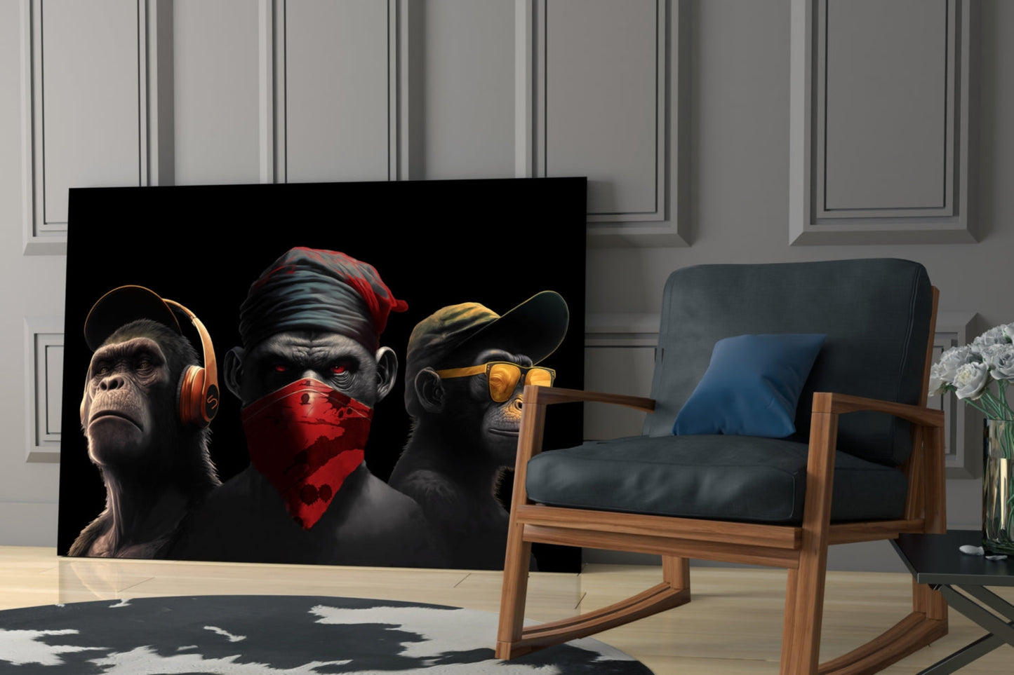Three stylized monkeys with red and gold accents displayed on black glass panel in modern living room setting.