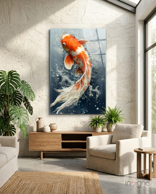 Orange and white koi fish glass wall art displayed above wooden console in modern living room with cream chairs and plants.