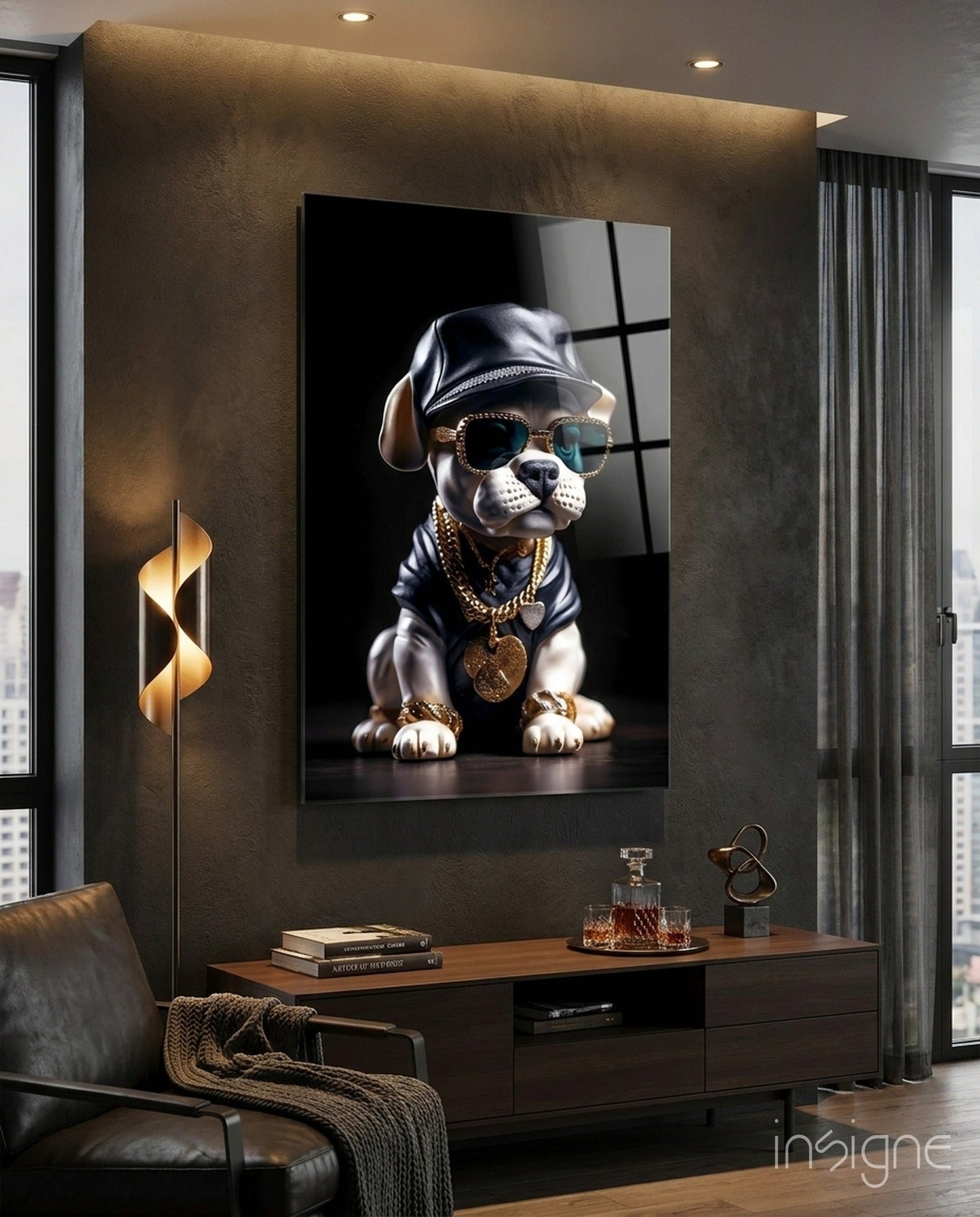 Stylish dog wearing sunglasses, leather hat, and gold chains displayed as framed glass art above wooden console in modern interior.