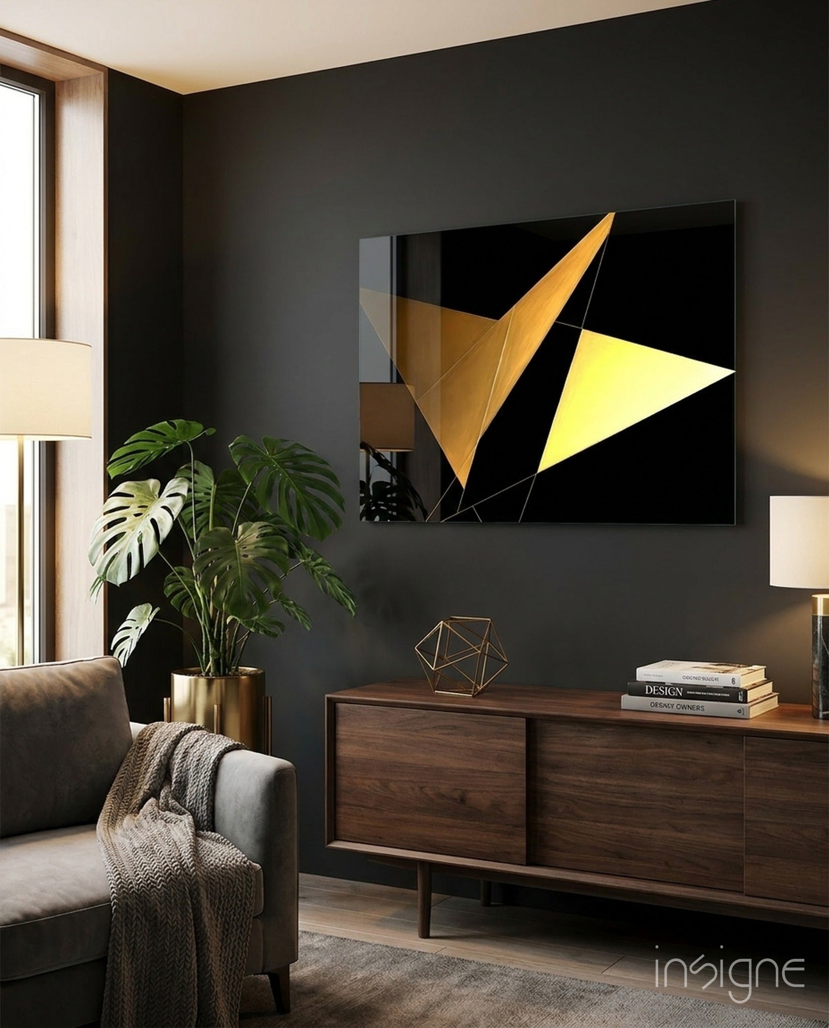 Modern living room featuring Yellow Wings Glass Wall Art mounted above a wooden dresser, displaying geometric gold and yellow triangles on black background.