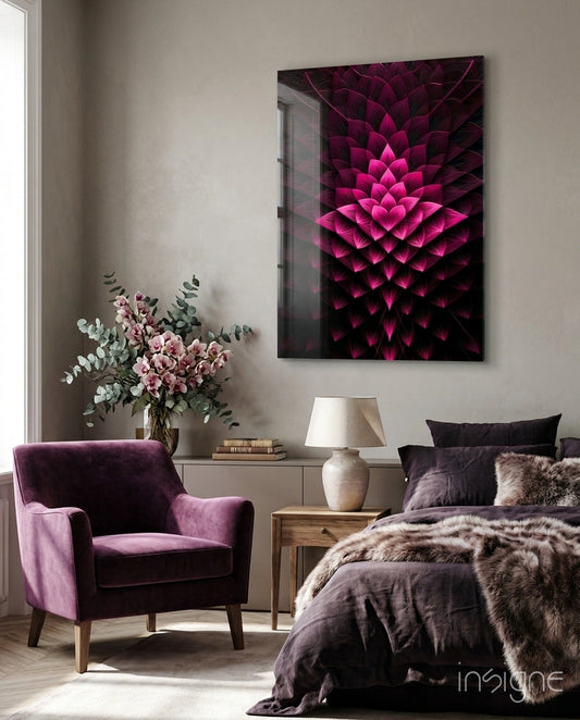 Magenta layered lotus fractal glass wall art displayed above a bedside table in a bedroom with purple velvet chair and pink flowers.