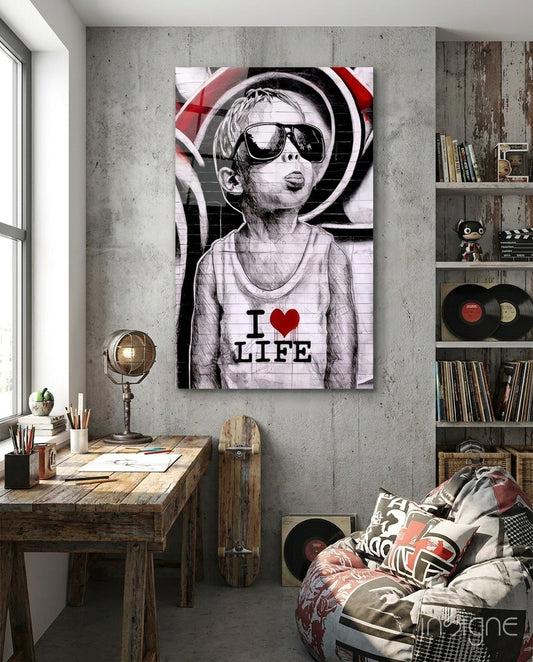 Glass wall art depicting a sketch-style boy wearing sunglasses and "I ❤ LIFE" shirt displayed in industrial bedroom setting.