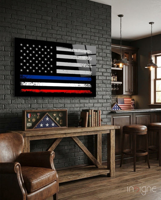 USA-France flag glass wall art displayed above wooden desk in dark brick interior with leather chair and pendant lighting.