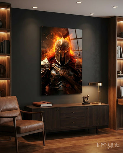 Warrior Glass Wall Art depicting fiery armored figure with glowing orange flames displayed above dark wooden desk in modern interior setting.