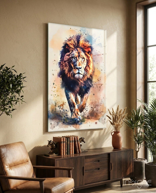 Watercolor splash lion glass wall art displayed above wooden furniture in a sunlit room with plants and leather chair.