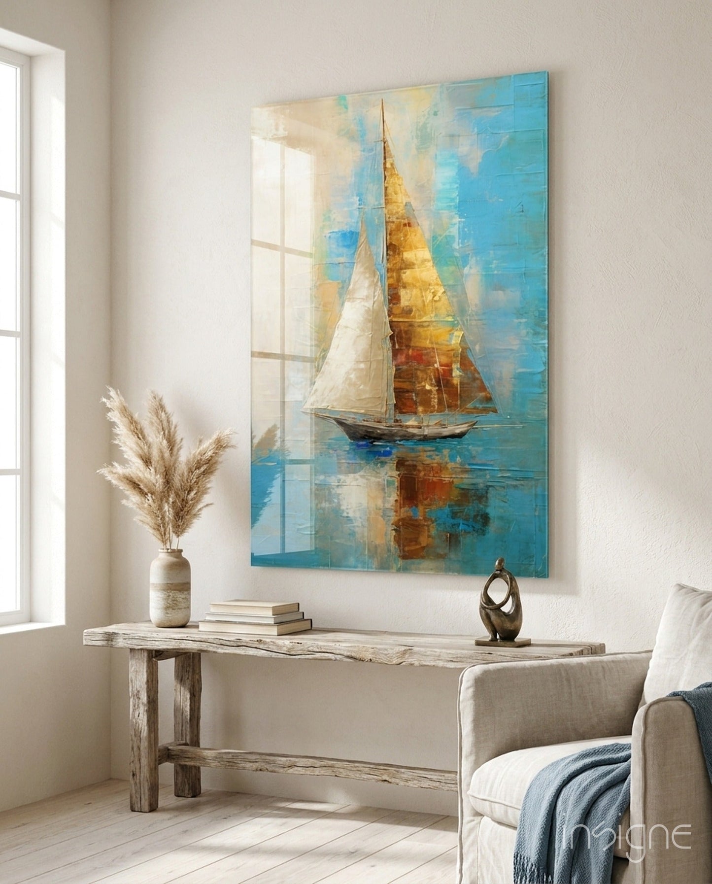 Sailing Glass Wall Art depicting a golden-sailed boat on turquoise water, displayed above a whitewashed wooden console table in a bright room.