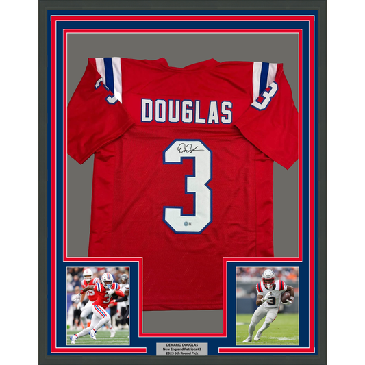 Red New England Patriots jersey number 3 signed by DeMario Douglas, displayed in frame with two action photos and nameplate below.