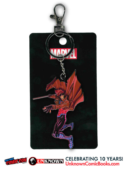 Front view of a metal Gambit keychain with a red coat and staff, mounted on a black card printed with the Marvel logo.