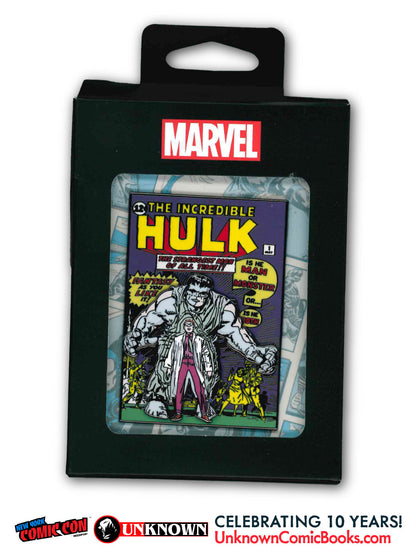 Front view of black packaging with a Marvel logo and a window showing a Hulk #1 cover pin with yellow lettering.