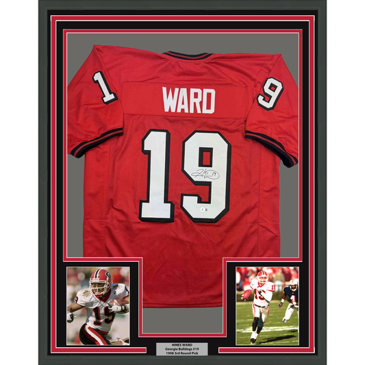 Framed red Georgia Bulldogs #19 football jersey with "WARD" nameplate, flanked by two action photos and authentication plaque.