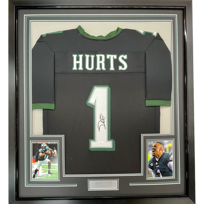 Framed Autographed/Signed Jalen Hurts 35x39 #1 Philadelphia Black Football Jersey JSA COA