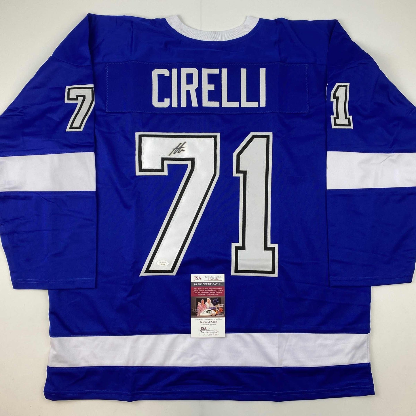 Blue and white striped hockey jersey with "CIRELLI" and number 71 displayed, featuring JSA authentication certificate attached.