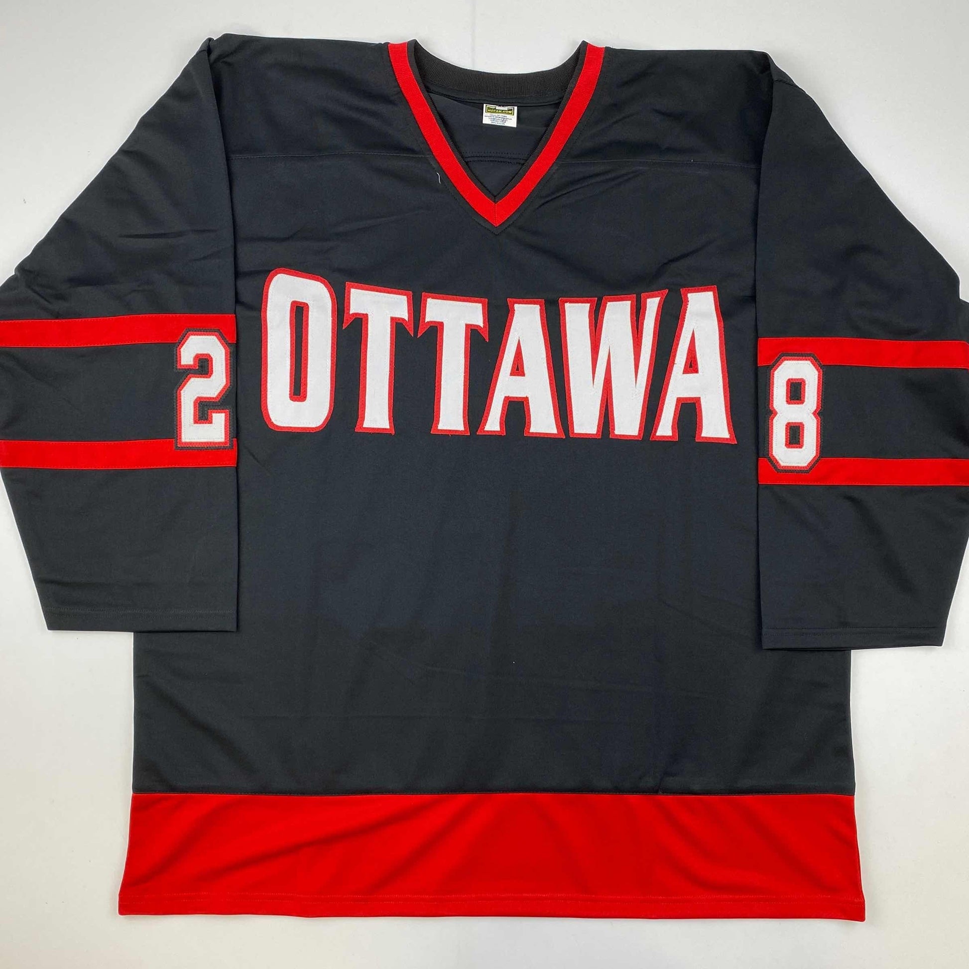 Black and red Ottawa hockey jersey with white "OTTAWA" text and numbers "2" and "8" on sleeves, displayed flat on white background.