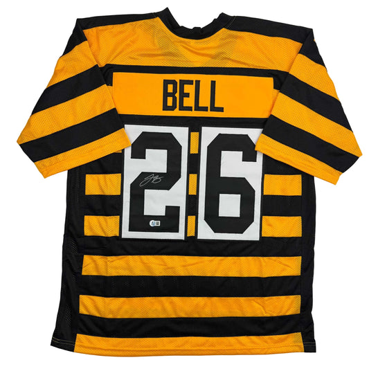 Black and gold horizontal striped football jersey with "BELL" nameplate and number "25" in white, displayed flat against white background.