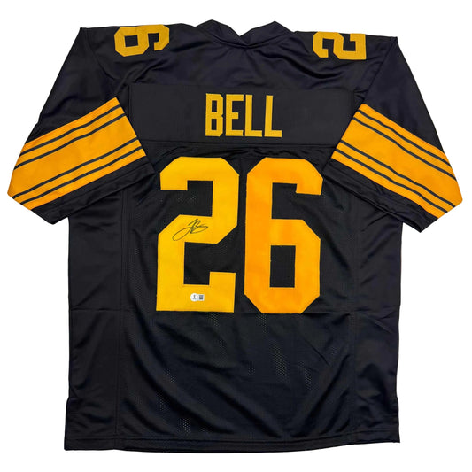 Black and gold Pittsburgh Steelers Color Rush jersey #26 with "BELL" nameplate, displayed flat showing front and sleeves with yellow striping.