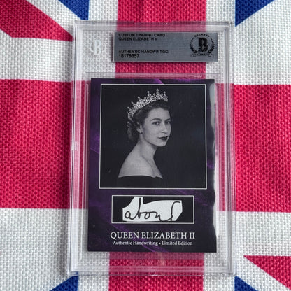 Encased trading card featuring black-and-white portrait of Queen Elizabeth II wearing tiara and her signature, displayed against Union Jack fabric background.