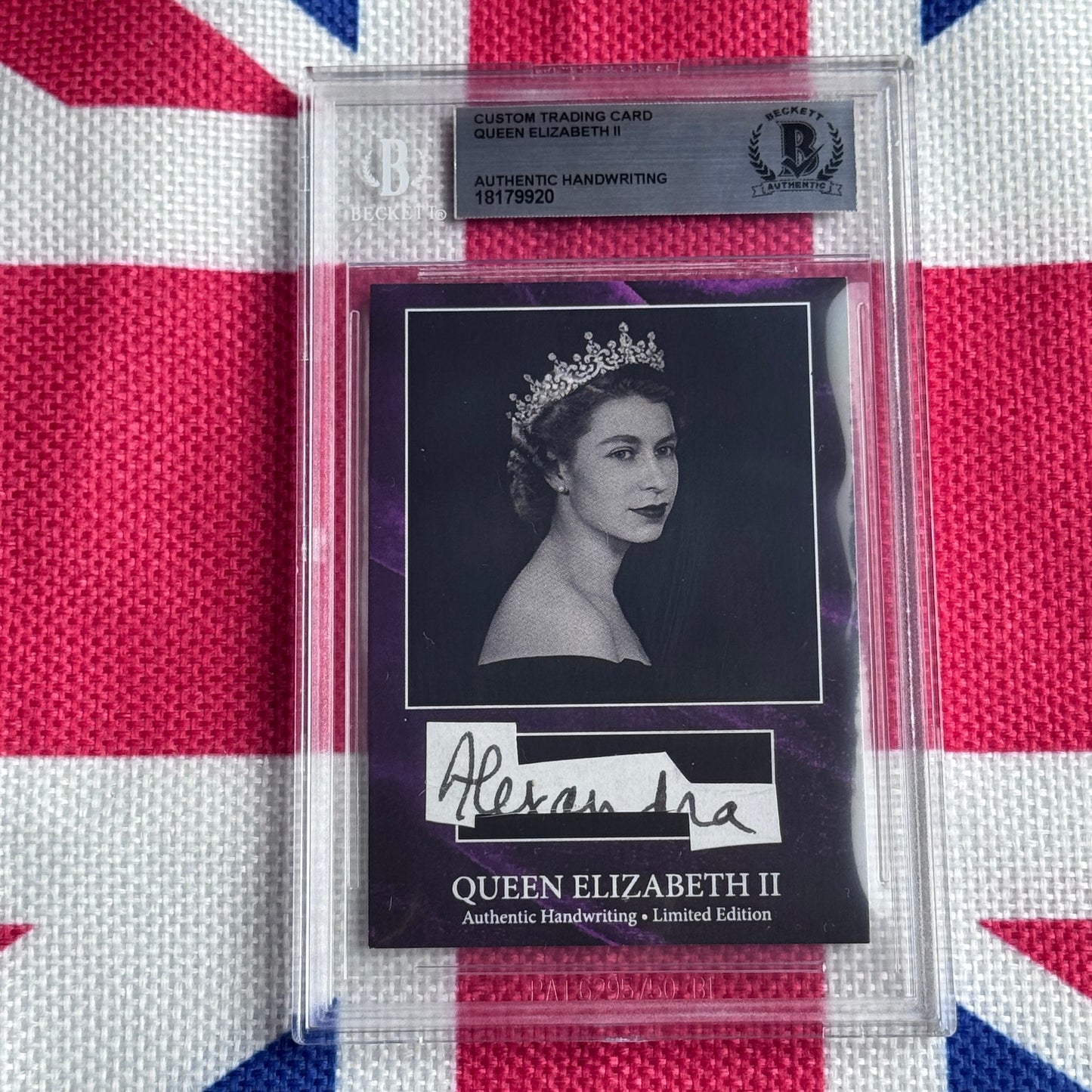 Custom trading card featuring Queen Elizabeth II portrait with tiara and authentic handwritten signature on Union Jack background.