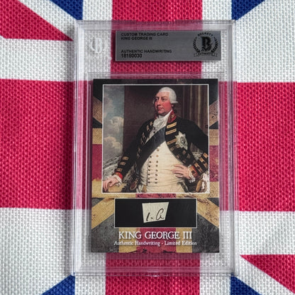 Beckett-authenticated King George III handwriting card in clear plastic case displayed against Union Jack background, showing portrait and signature detail.