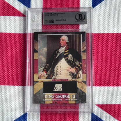 Custom trading card of King George III with authentic handwriting sample and portrait, displayed in protective plastic case against Union Jack background.