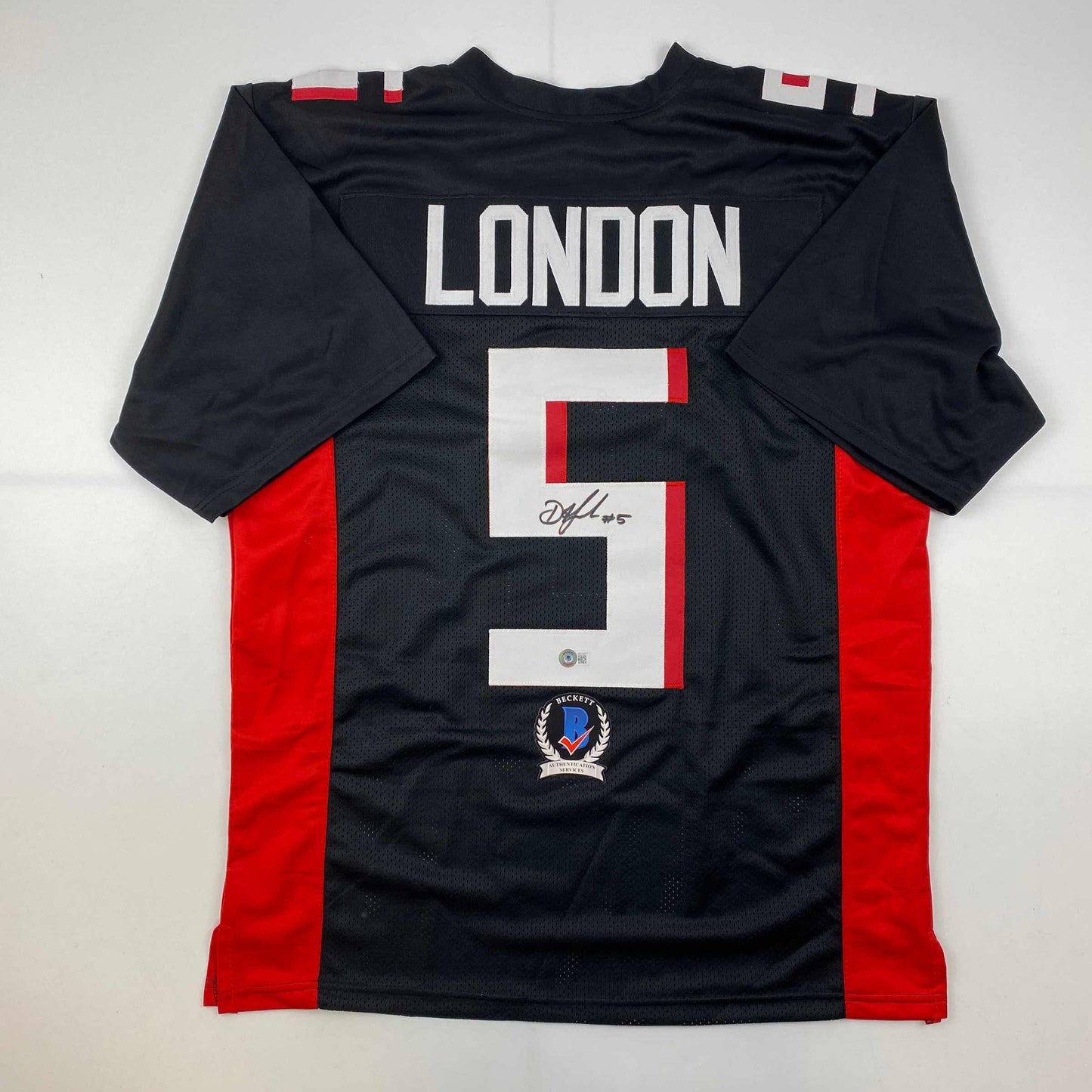 Autographed/Signed Drake London Atlanta Falcons Black Football Jersey Beckett BAS COA