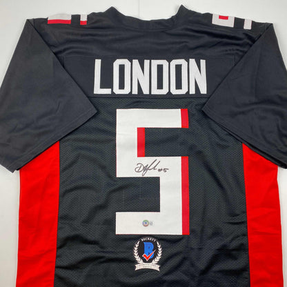 Autographed/Signed Drake London Atlanta Falcons Black Football Jersey Beckett BAS COA