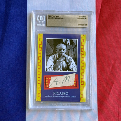 Front view of a Beckett-sealed card with a black-and-white portrait photo, a handwritten "A. M." strip, and "PICASSO" lettering.