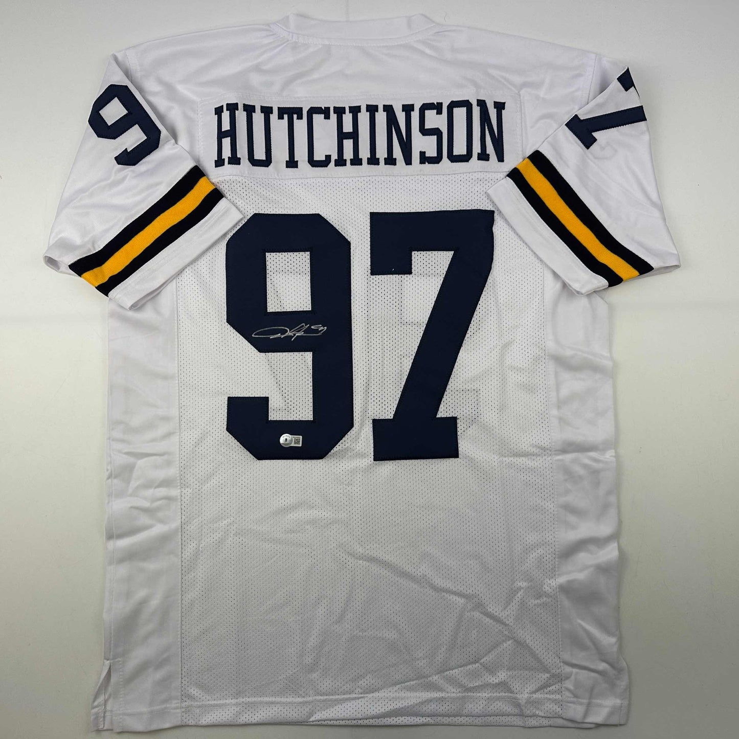 Autographed/Signed Aidan Hutchinson Michigan White College Football Jersey