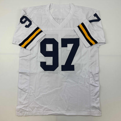 Autographed/Signed Aidan Hutchinson Michigan White College Football Jersey