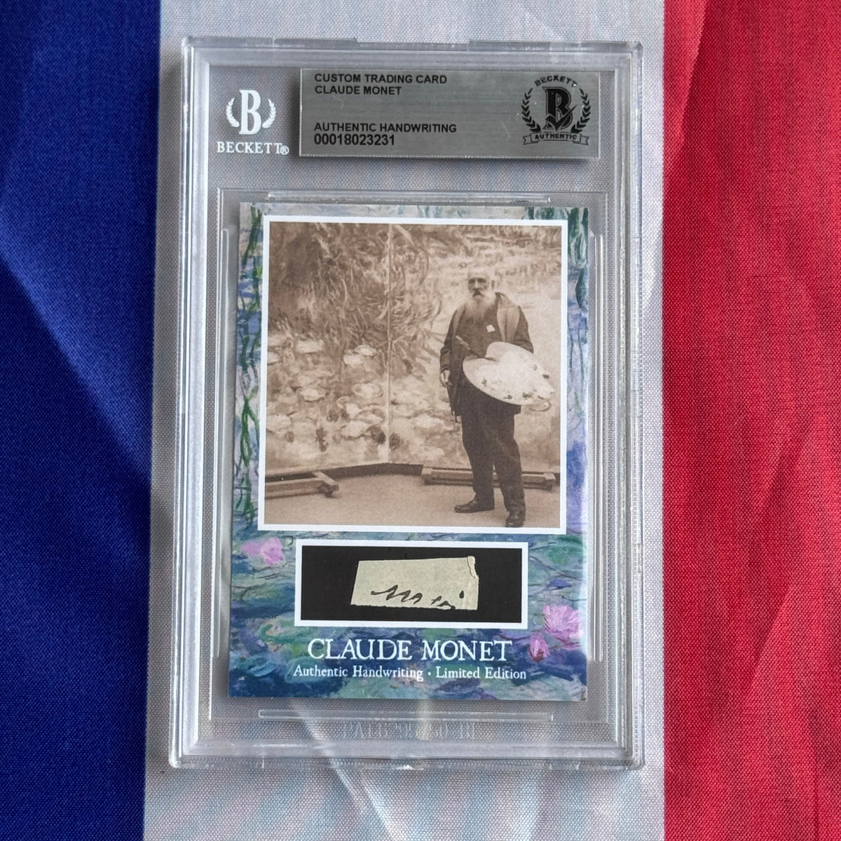 Front view of a Beckett-sealed card: sepia photo of a bearded man holding a palette, with a handwriting sample below.