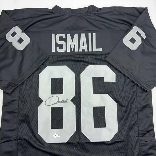 Autographed/Signed Raghib Ismail Rocket Oakland Black Football Jersey Beckett BAS COA