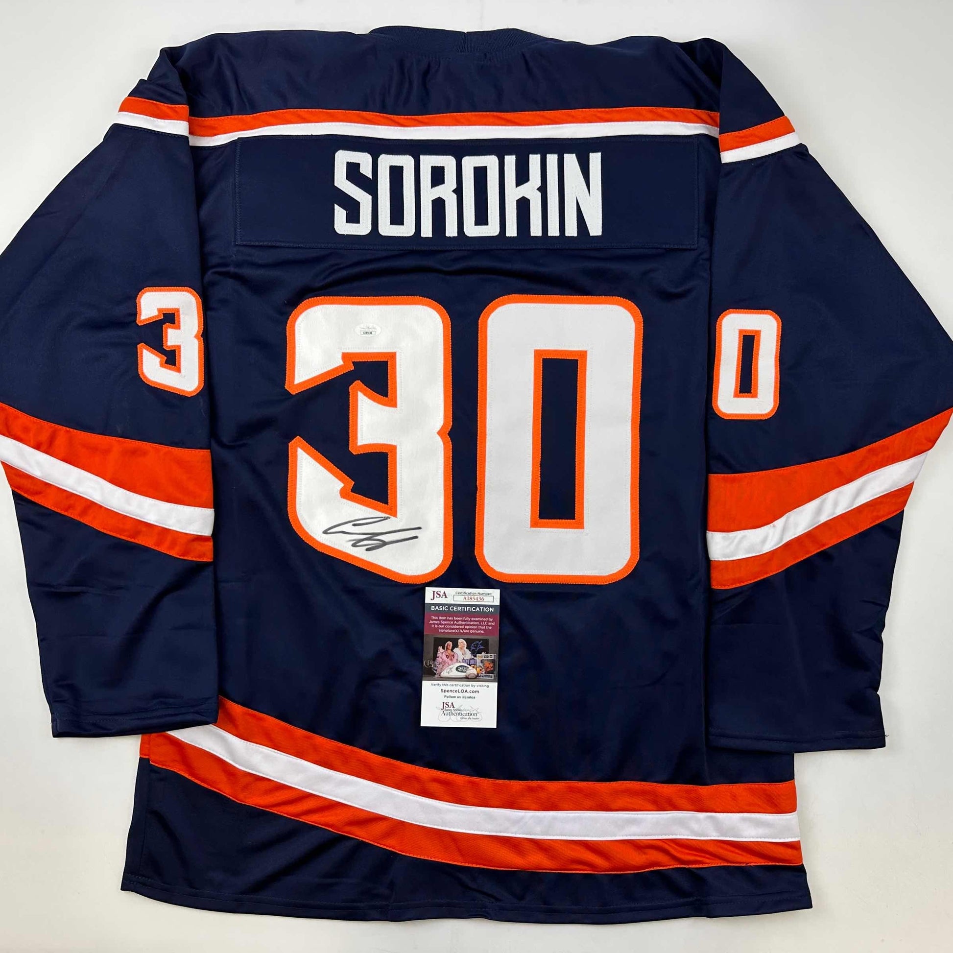 Navy blue hockey jersey with orange and white stripes, number 30, "SOROKIN" nameplate, and JSA authentication certificate visible.
