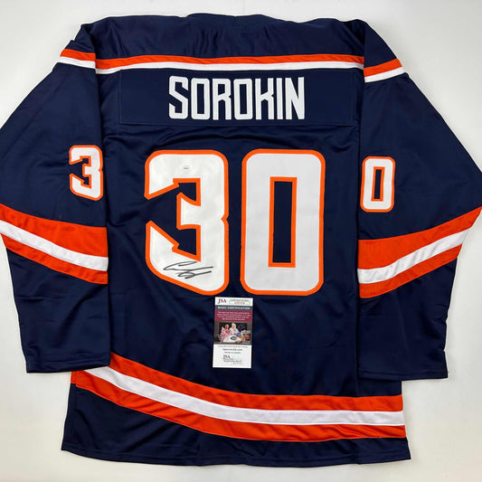 Navy blue hockey jersey with orange and white stripes, number 30, "SOROKIN" nameplate, and JSA authentication certificate visible.