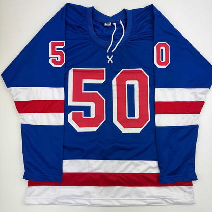 Blue, white, and red striped hockey jersey with large red number 50 and smaller numbers 5 and 0 on shoulders, displayed flat against white background.