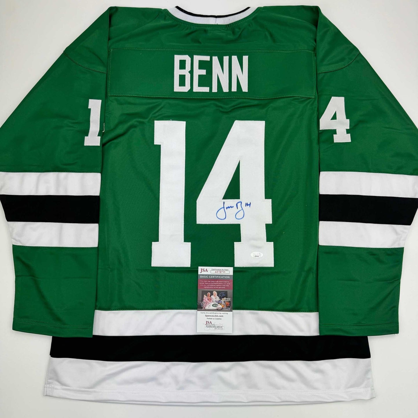 Back view of green and white hockey jersey numbered 14 with "BENN" nameplate and blue autograph, displaying JSA authentication certificate.