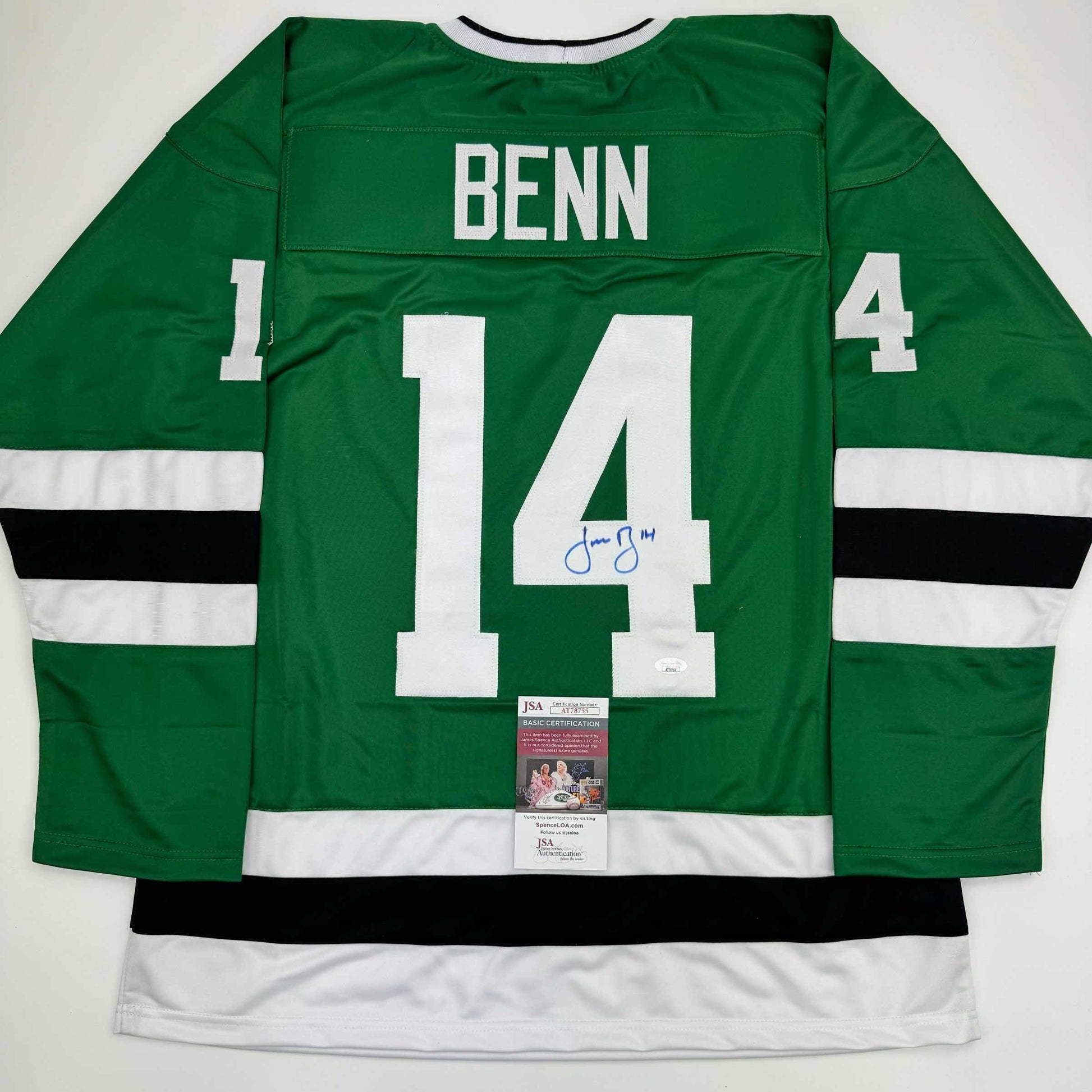 Back view of green and white hockey jersey numbered 14 with "BENN" nameplate and blue autograph, displaying JSA authentication certificate.