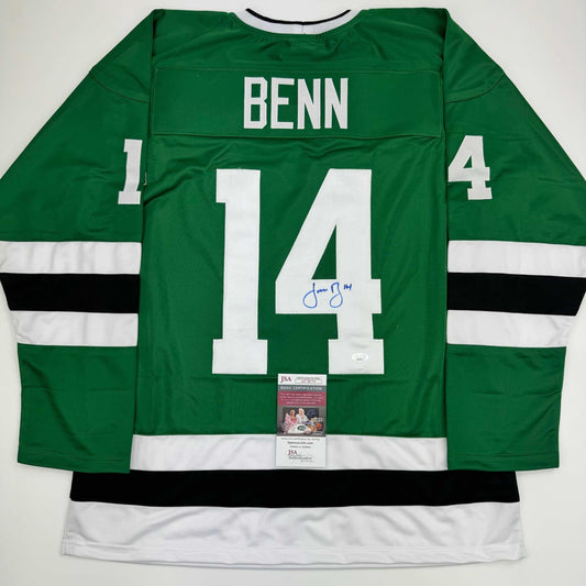 Back view of green and white hockey jersey numbered 14 with "BENN" nameplate and blue autograph, displaying JSA authentication certificate.