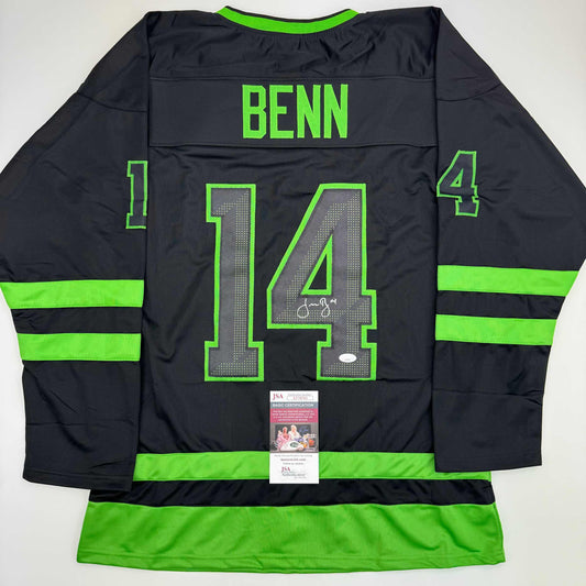 Back view of black and neon green hockey jersey with "BENN" nameplate and number 14, signed, with JSA authentication sticker visible.