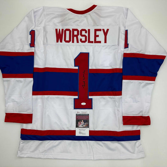 White Montreal Canadiens hockey jersey with red and blue horizontal stripes, "WORSLEY" nameplate, number 1, and JSA authentication certificate visible.