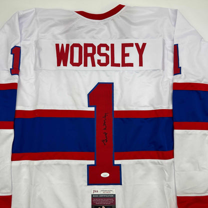 Back view of white Montreal Canadiens hockey jersey number 1 with "WORSLEY" nameplate and signature, featuring red and blue horizontal stripes with JSA authentication certificate visible at bottom.