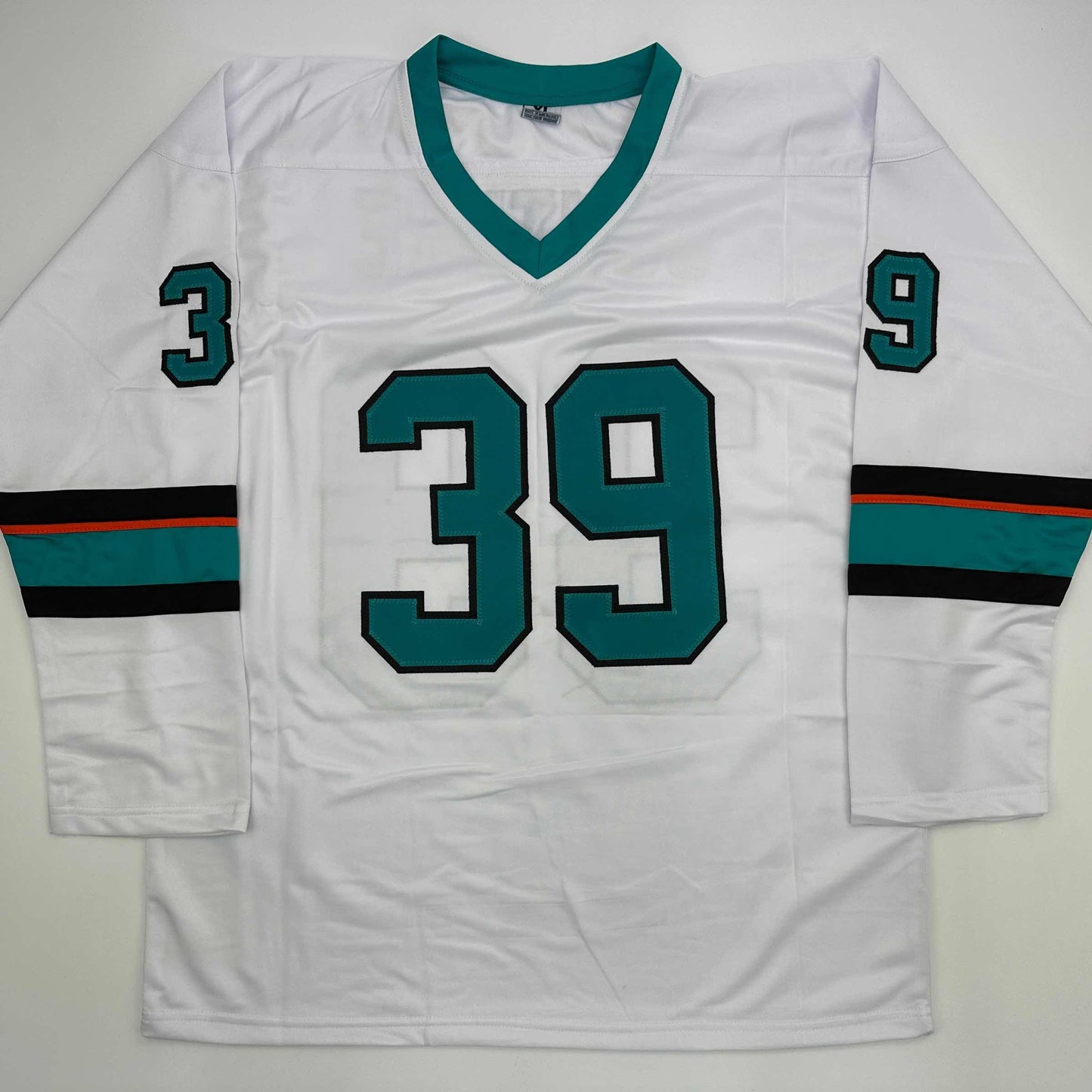 White hockey jersey with teal and black striping, displaying number 39 on chest and numbers 3 and 9 on sleeves, laid flat.